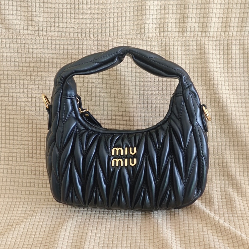 Miu Miu Black Quilted Crossbody Bag with Gold Accents